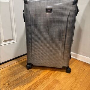 Tumi Carbon Fiber Pattern Suitcase